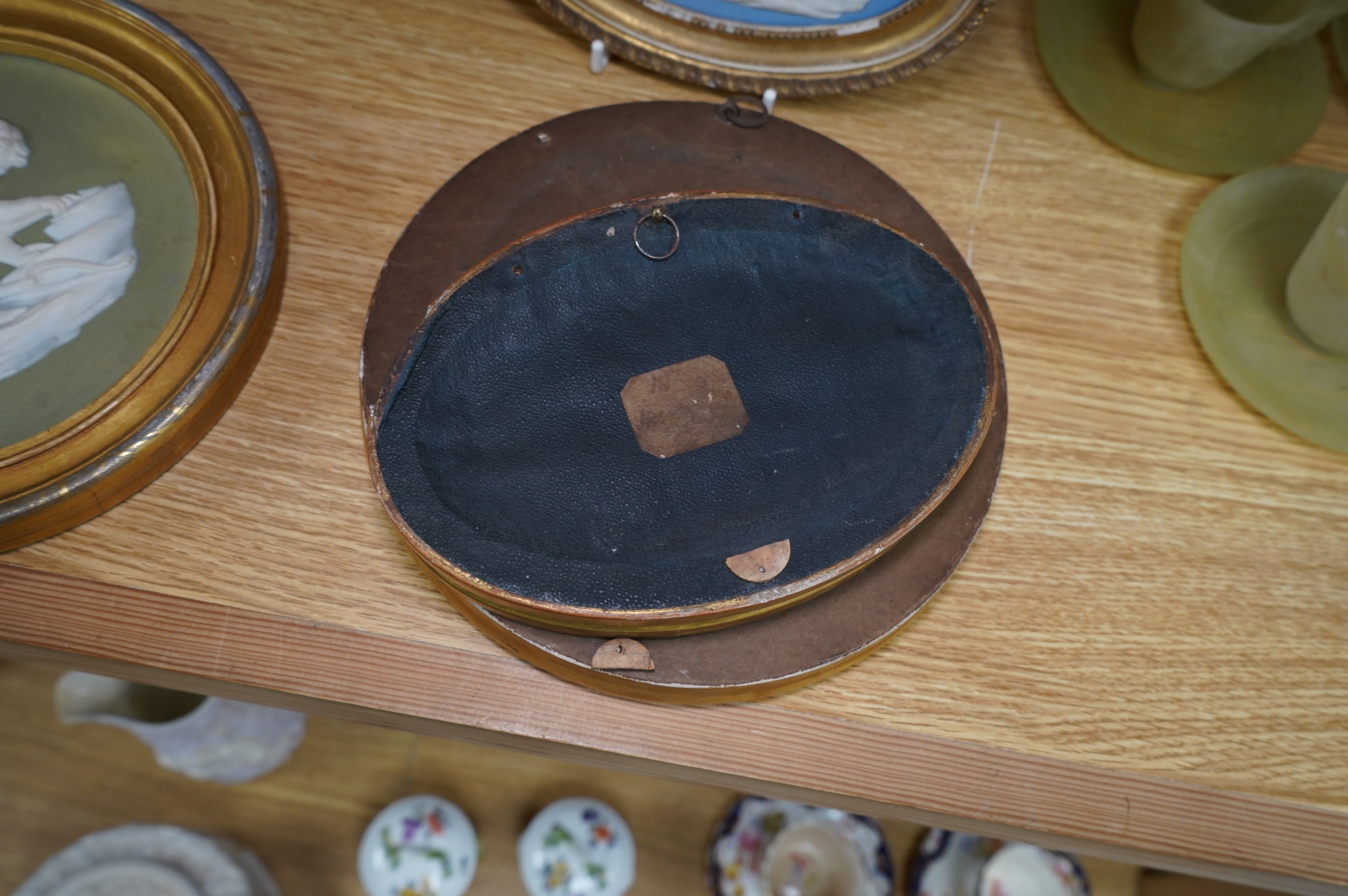 Two pairs of jasperware plaques, probably Wedgwood, in gilt frames, largest 19cm in diameter. Condition - fair to good